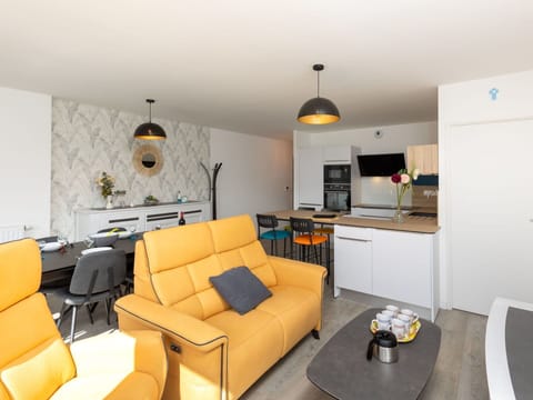 Table, Couch, Furniture, Property, Picture Frame, Interior Design, Studio Couch, Orange, Living Room, Television