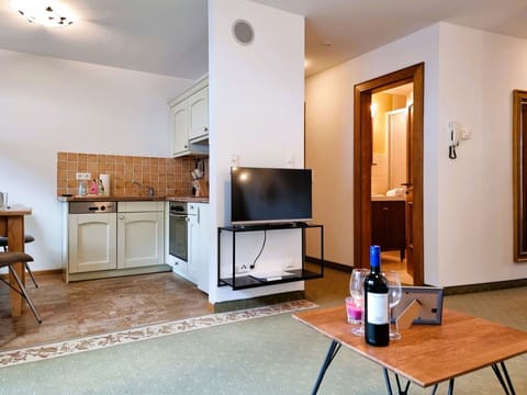 Furniture, Property, Building, Wood, Interior Design, Living Room, Home Appliance, Table, Cabinetry, Floor