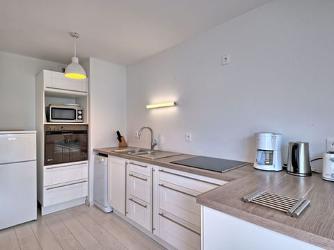 Cabinetry, Countertop, Building, Sink, Drawer, Kitchen, Kitchen Stove, Kitchen Appliance, Lighting, Interior Design