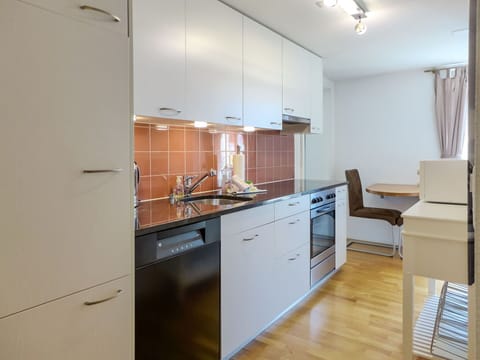 Cabinetry, Countertop, Furniture, Building, Drawer, Kitchen Stove, Kitchen Appliance, Kitchen, Wood, Interior Design