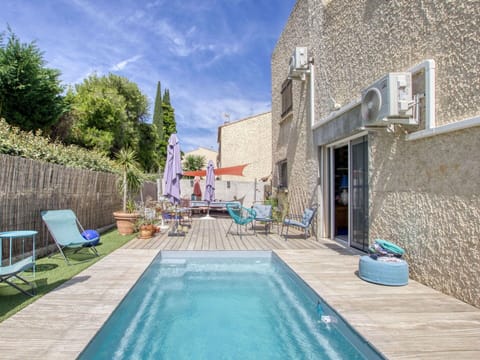 Water, Plant, Sky, Property, Building, Swimming Pool, Azure, Outdoor Furniture, Cloud, Architecture