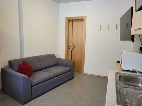 Furniture, Comfort, Wood, Couch, Architecture, Building, Floor, Door, Wall