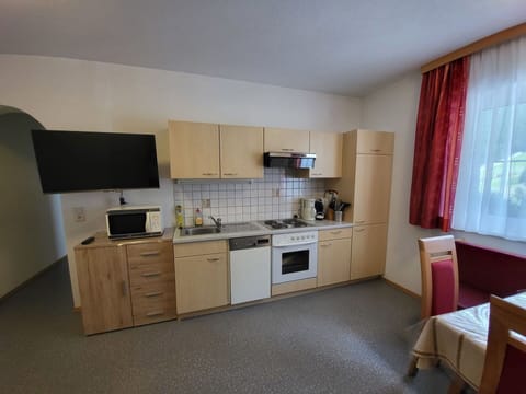 Cabinetry, Furniture, Countertop, Window, Building, Kitchen Stove, Home Appliance, Kitchen Appliance, Curtain, Kitchen