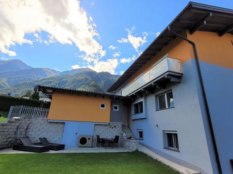 Sky, Cloud, Building, Property, Window, Mountain, Plant, Azure, House, Residential Area