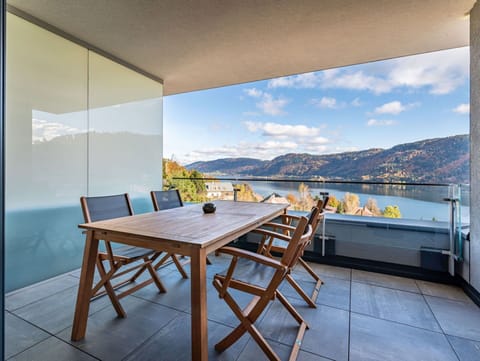Table, Furniture, Building, Sky, Cloud, Water, Wood, Shade, Mountain, Chair