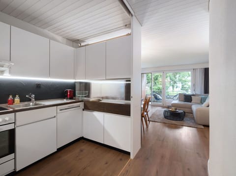 Kitchen, Interior Design, Flooring, Countertop, Ceiling, Wood, Floor, Kitchen Appliance, Furniture, Major Appliance