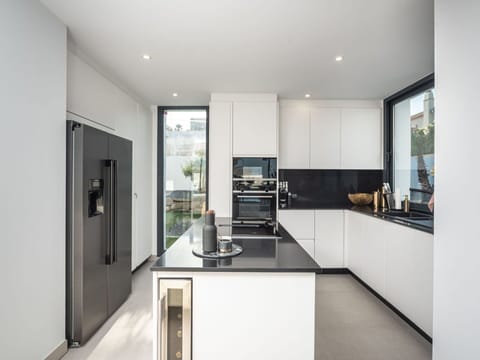 Cabinetry, Property, Countertop, Home Appliance, Kitchen Appliance, Interior Design, Kitchen Stove, Kitchen, Flooring, Floor