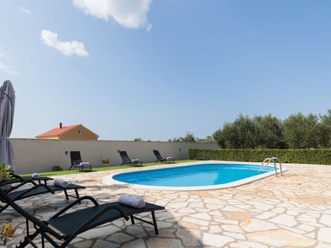 Water, Sky, Cloud, Property, Swimming Pool, Azure, Shade, Outdoor Furniture, Leisure, Tree