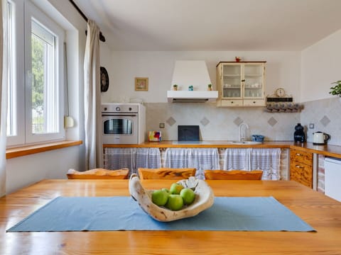 Furniture, Property, Cabinetry, Table, Window, Countertop, Azure, Wood, Interior Design, Kitchen