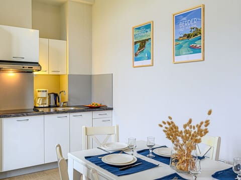 Property, Cabinetry, Countertop, Blue, Building, Kitchen Appliance, Kitchen Stove, Interior Design, Kitchen, Wall