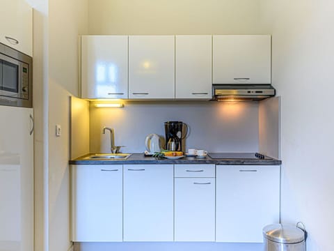 Cabinetry, Property, Kitchen Sink, Kitchen Appliance, Countertop, Sink, Kitchen, Home Appliance, Kitchen Stove, Tap