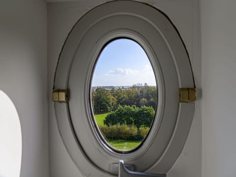 Sky, Property, Furniture, Table, Building, Water, Chair, Wood, Shade, Interior Design