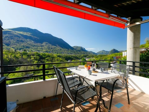Sky, Property, Table, Furniture, Shade, Mountain, Interior Design, Leisure, Chair, Wood