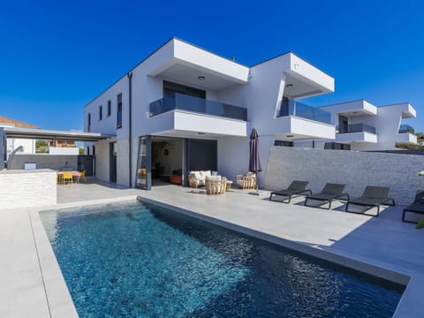 Water, Plant, Building, Sky, Property, Azure, Nature, Tree, Swimming Pool, Blue