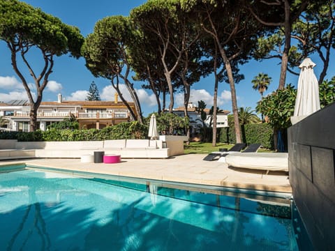 Water, Sky, Plant, Property, Building, Azure, Shade, Swimming Pool, Tree, Leisure