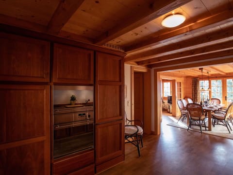 Furniture, Cabinetry, Chair, Wood, Drawer, Lighting, Building, Window, Hall, Flooring