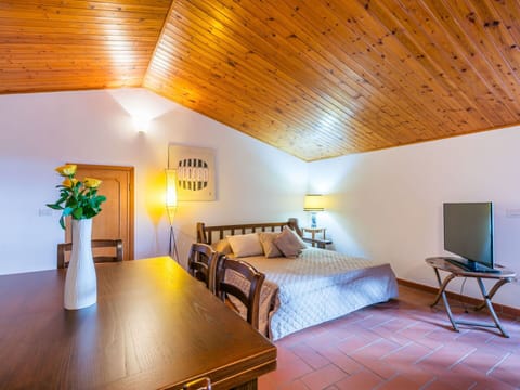 Furniture, Building, Plant, Property, Table, Comfort, Lighting, Wood, Houseplant, Interior Design
