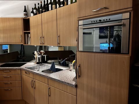 Cabinetry, Countertop, Property, Sink, Kitchen, Wood, Interior Design, Building, Tap, Home Appliance