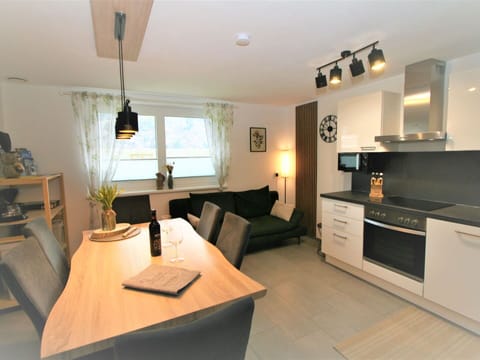 Furniture, Cabinetry, Countertop, Houseplant, Wood, Table, Home Appliance, Floor, Kitchen, Chair