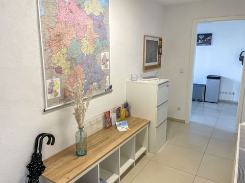 Property, Picture Frame, Interior Design, Map, Paint, Floor, Flooring, Wood, Table, Art