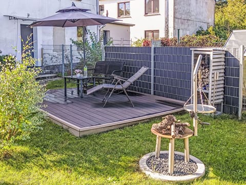 Plant, Building, Window, Outdoor Table, Lighting, Outdoor Furniture, Grass, Chair, Groundcover, House