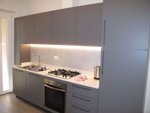 Sky, Building, Property, Plant, Cloud, Architecture, Window, Tree, Urban Design, Slope