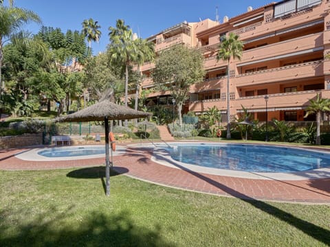 Plant, Sky, Property, Water, Tree, Azure, Building, Architecture, Arecales, Residential Area