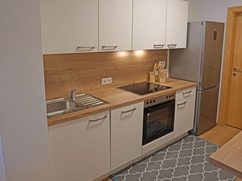 Cabinetry, Kitchen Sink, Countertop, Sink, Building, Tap, Kitchen Appliance, Kitchen Stove, Home Appliance, Kitchen