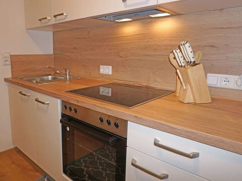 Cabinetry, Countertop, Furniture, Property, Kitchen Sink, Building, Sink, Tap, Kitchen Stove, Wood