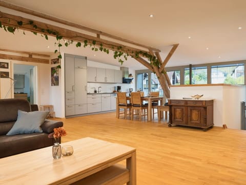 Table, Furniture, Property, Couch, Wood, Interior Design, Chair, Flooring, Houseplant, Floor