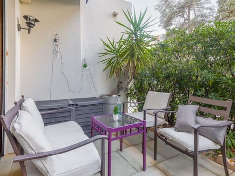 Furniture, Plant, Property, Comfort, Building, Interior Design, Table, Outdoor Furniture, Shade, Floor