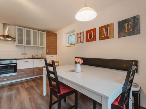 Property, Furniture, Cabinetry, Table, Countertop, Kitchen Appliance, Wood, Lighting, Interior Design, Chair