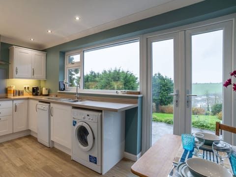 Furniture, Property, Building, Plant, Cabinetry, Kitchen Sink, Table, Sink, Countertop, Wood