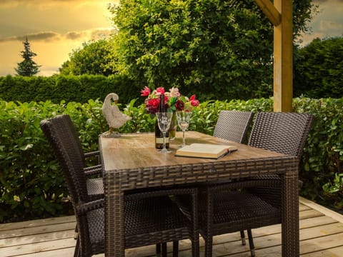 Table, Flower, Plant, Furniture, Property, Chair, Cloud, Botany, Outdoor Table, Sky