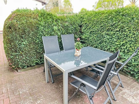 Plant, Table, Furniture, Property, Plant Community, Green, Outdoor Table, Outdoor Furniture, Rectangle, Chair