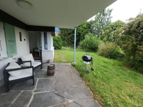 Plant, Couch, Building, Land Lot, Tree, Shade, Real Estate, Grass, Flooring, Landscape