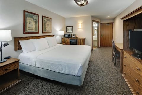 Unwind in a cozy king room with work desk.
