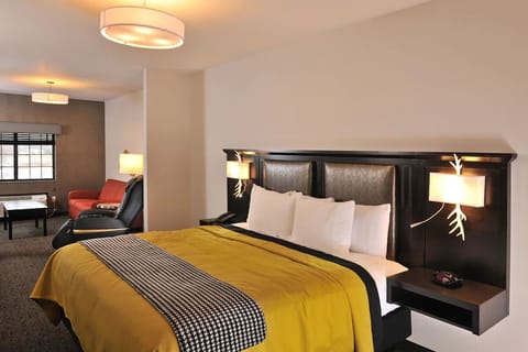 Stretch out on a plush bed in a roomy suite.