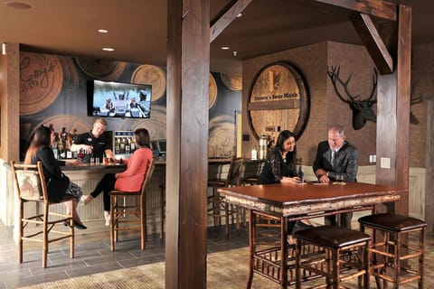 Gather around the bar for a relaxed nightcap together.