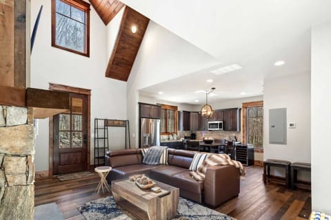 Open Floor Plan with High Vaulted Ceilings and Bright Natural Light