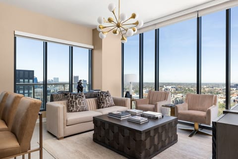 Living room featuring a 65" 4K UHD TV