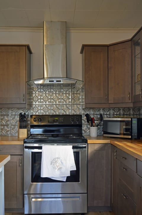 We love this backsplash and range hood!