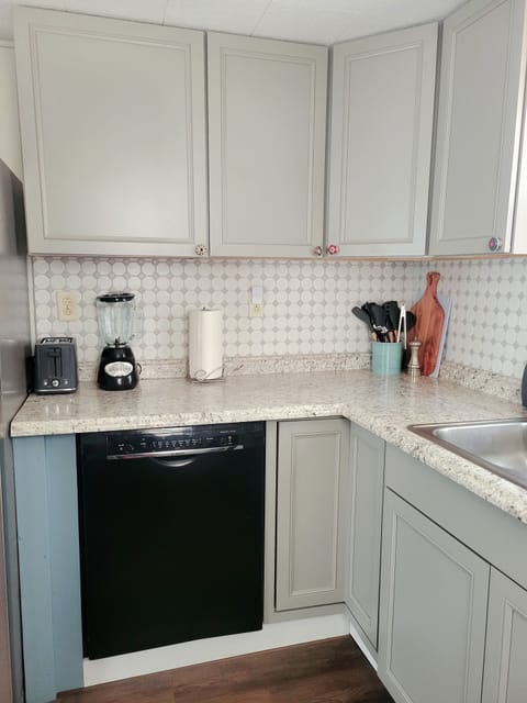 Dishwasher tablets are available in the right side cupboard under the sink.