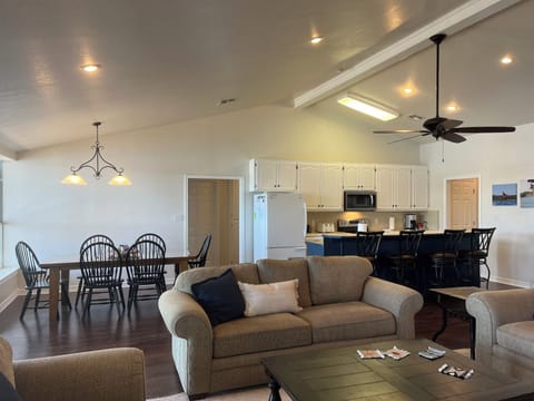 Living room, dining area and kitchen with open floor plan