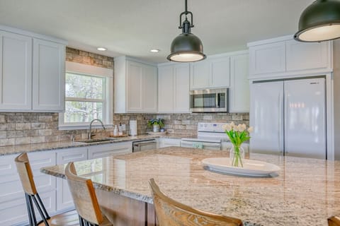 Large kitchen with island and seating