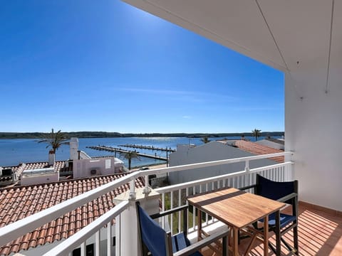 Private terrace with sea and Fornells Bay views.