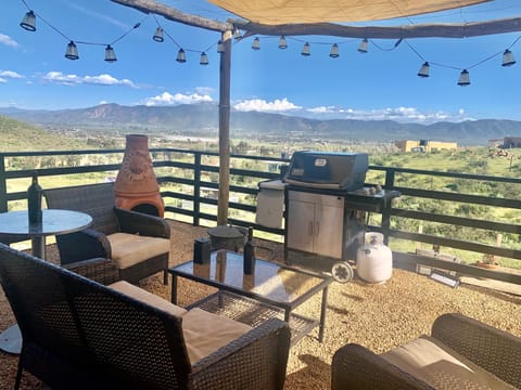 Savor valley views with our patio set and spacious barbecue