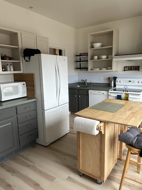 Large open kitchen with seating for 2