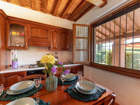 Table, Cabinetry, Furniture, Property, Plant, Building, Tableware, Window, Countertop, Dishware