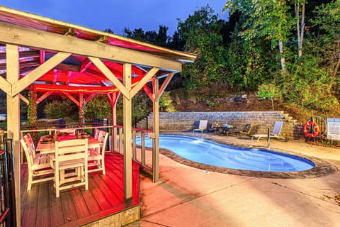 Play cards while kids splash in the pool.